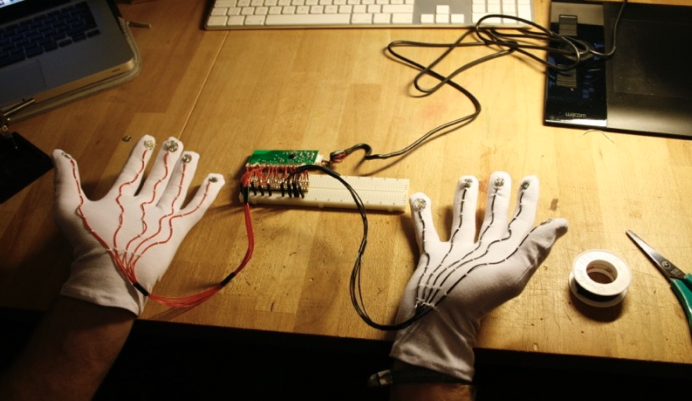 A prototype of electronically connected gloves